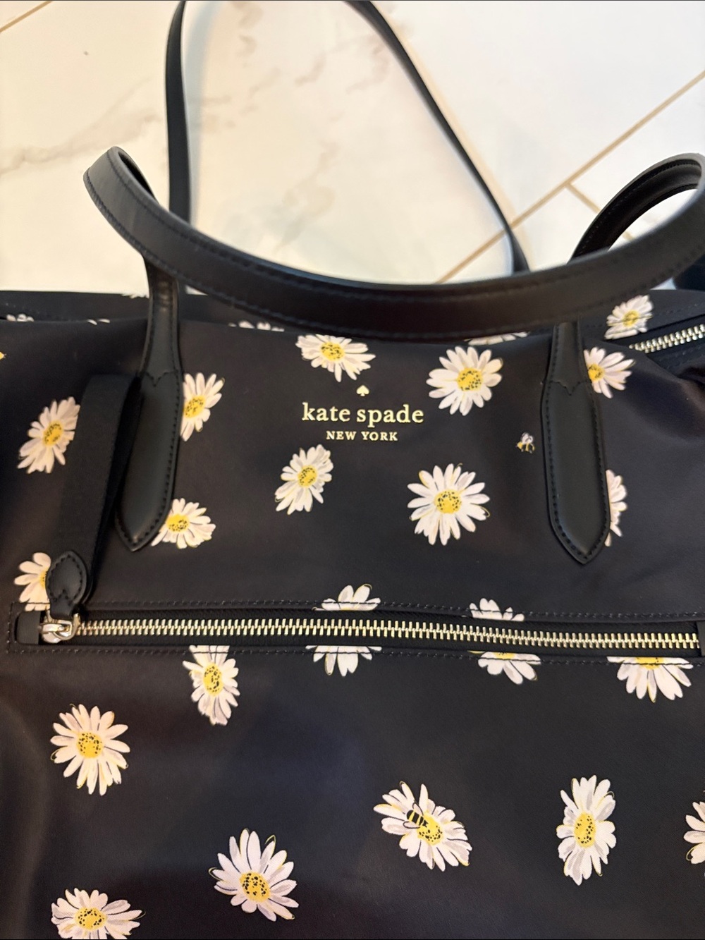 kate spade Black Daisy Print weekender bag with Gold Logo